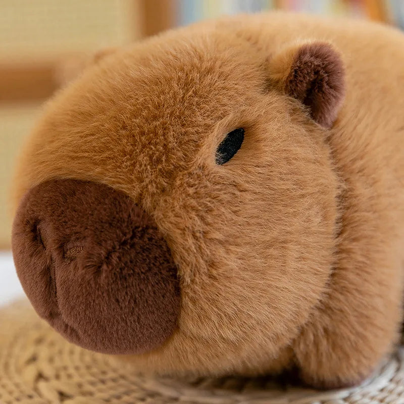 Fluffy Haven’s lovable capybara plush, part of the Avo Buddy™ set, shown in a close-up highlighting its soft brown fur and gentle features.