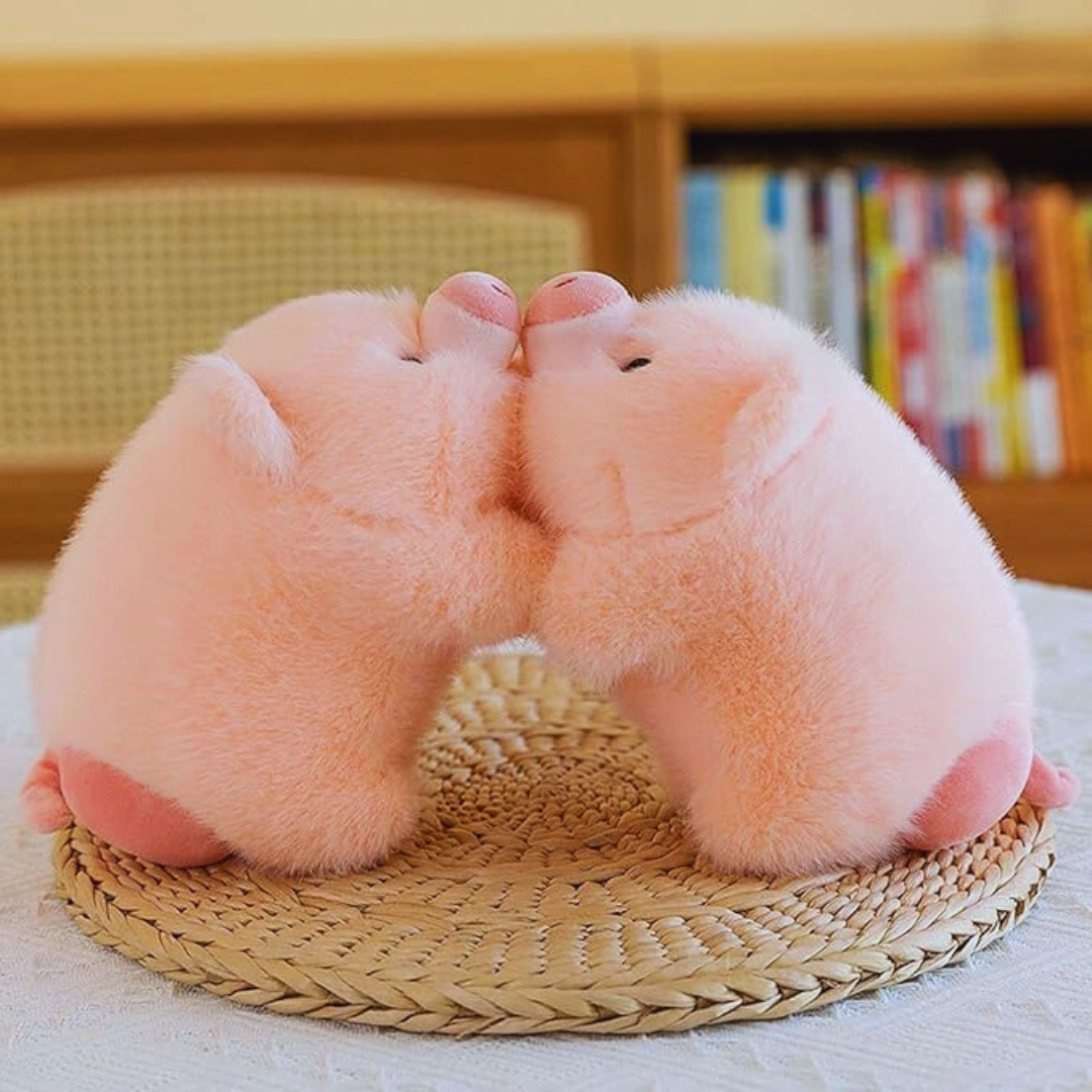 Soft pig plush toy from Piggy Puff™ with detachable fruit shell removed, showing full pig body