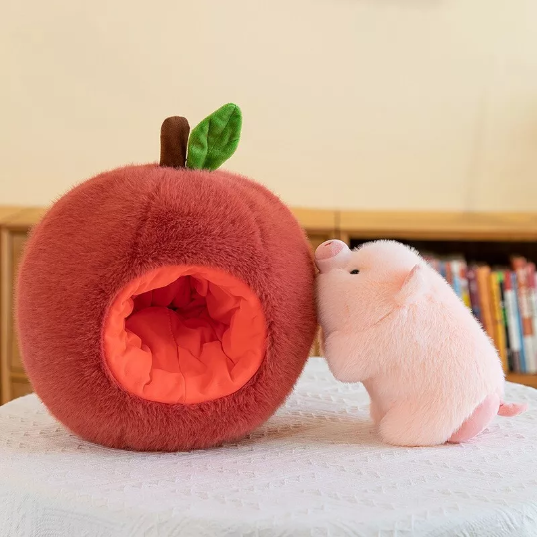 Back view of Piggy Puff™ plush toy showing piggy bottom and tail inside soft round fruit design